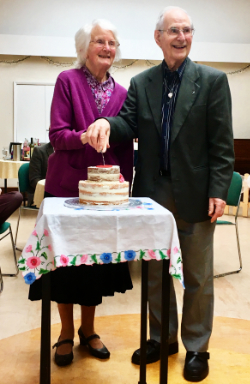 cutting the cake at Good Shepherd hall